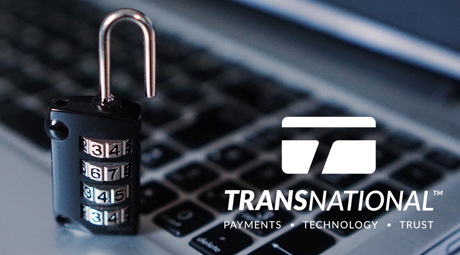 Digital combination padlock next to the laptop and the TransNational Payments logo