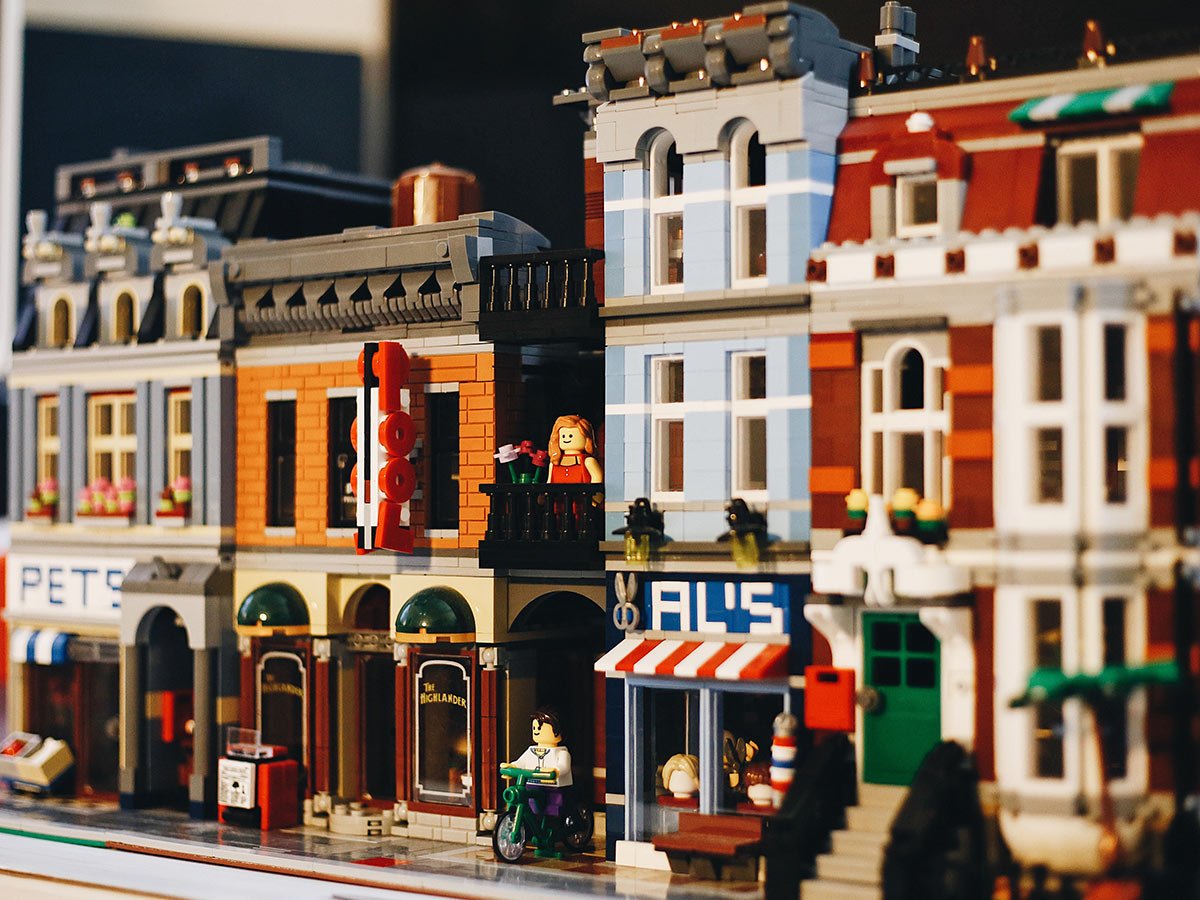 Street with small business buildings made out of lego