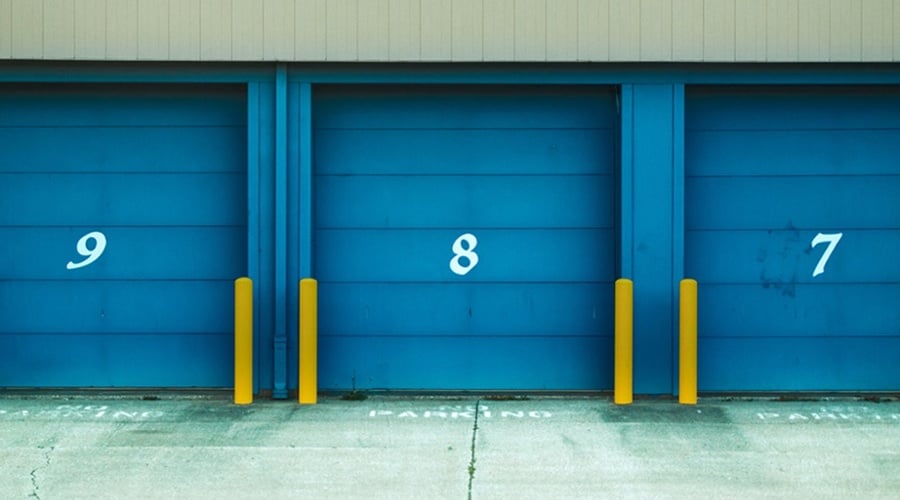 Blue storage garages numbered seven, eight and nine